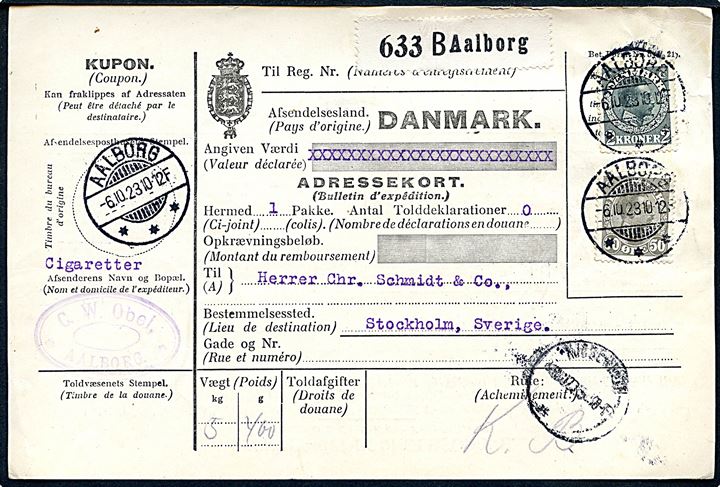 50 øre og 2 kr. Chr. X på internationalt adressekort for pakke fra Aalborg d. 6.10.1923 til Stockholm, Sverige.