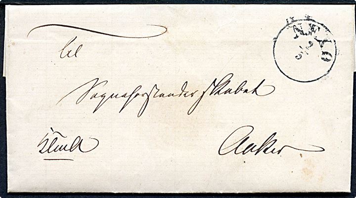 1865. Ufrankeret tjenestebrev mærket K.T.m.A. med fuldt indhold og antiqua Nexø d. 2.5.1865 til Sogneforstanderskabet i Aaker.