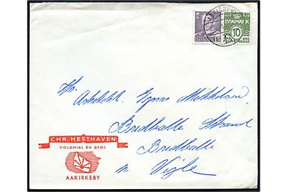 10 øre Bølgelinie og 15 øre Fr. IX på illustreret firmakuvert fra Chr. Hesthaven annulleret med brotype Vc Aakirkeby B. d. 23.10.1951 til Bredballe pr. Vejle.