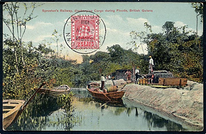 2 cents på billedside at brevkort (Sproston's Railway, discharging Cargo during Floods) stemplet Georgetown d. 25.11.1911 til Esbjerg, Danmark.
