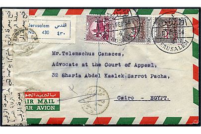 5 fils og 20 fils (2) Jordanske Tvangstillægsmærker overtrykt Postage på anbefalet brev fra jordansk besat Palestina stemplet Jerusalem d. 1.2.1954 til Cairo, Egypten. Åbnet af egyptisk censur.