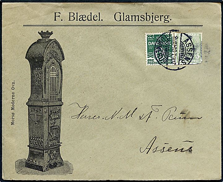 5 øre Bølgelinie og 5 øre Fr. VIII helsagsafklip på illustreret firmakuvert fra F. Blædel i Glamsbjerg annulleret med bureau Assens - Tommerup T.907 d. 20.10.1913 til Assens.