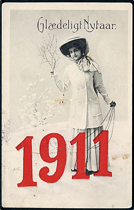 Årstalskort. Glædeligt Nytaar 1911. Kvinde iført hvid kjole og jakke. Stenders u/no. (Afrevet mærke). 