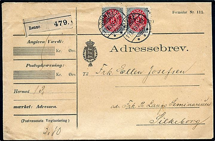 8 øre Tofarvet omv. rm. i parstykke på adressebrev for pakke fra Rønne d. 17.10.1899 til Silkeborg.