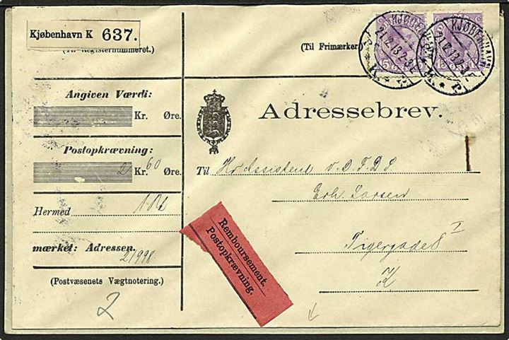 15 øre Chr. X i parstykke på lokalt adressebrev for pakke med opkrævning i Kjøbenhavn d. 21.12.1913. Et mærke med mgl. hjørne.