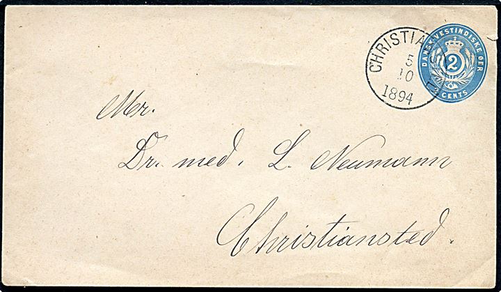 2 cents lokal helsagskuvert annulleret Christiansted d. 5.10.1894.