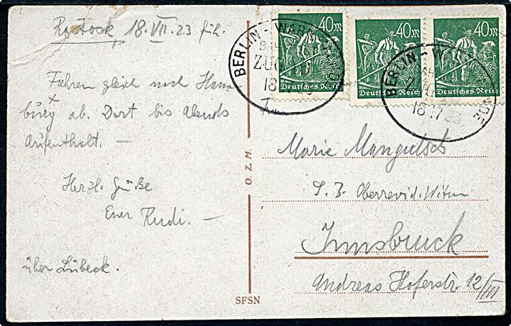 40 mk. infla udg. i 3-stribe på brevkort fra Rostock annulleret med bureaustempel Berlin - Warnemünde Bahnpost Zug 16 d. 18.7.1923 til Innsbruck, Østrig.
