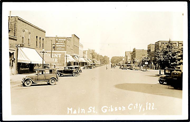 USA, Gibson City, Ill., Main Street med automobiler. U/no.