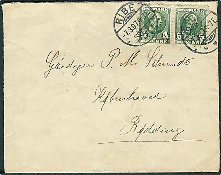 5 øre Chr. IX i parstykke på Grænseporto brev fra Ribe d. 7.3.1907 til Københoved pr. Rødding - eftersendt til Schottburg som er korrekt postadresse. Ank. d. 8.3.1907.