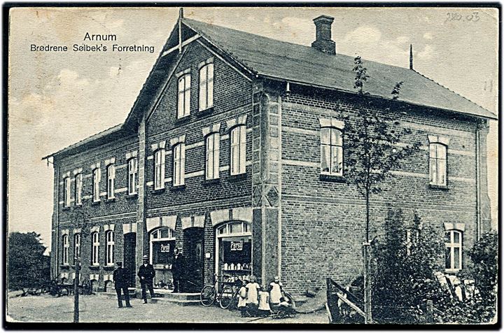 10 øre Bølgelinie på brevkort (Bdr. Sølbeks' forretning i Arnum) annulleret med bureaustempel Vojens - Gramby - Arnum T.48 d. 15.8.1930 til Hellerup.