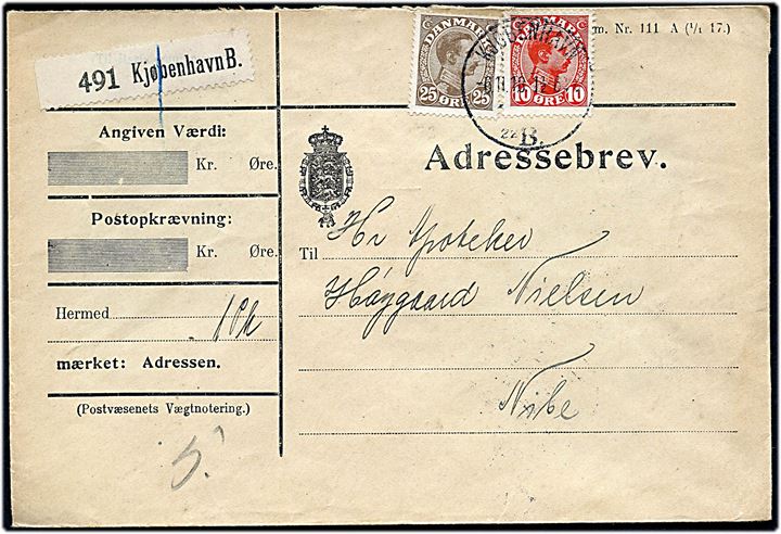10 øre og 25 øre Chr. X på adressebrev for pakke fra Kjøbenhavn d. 6.11.1918 til Nibe.