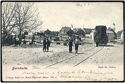 Neksø, parti med jernbanevogn og stationen i baggrunden. Colberg no. 17.