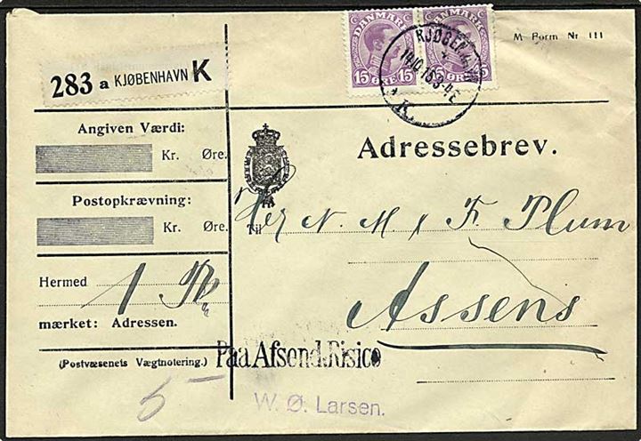 15 øre Chr. X i parstykke på adressebrev for pakke fra Kjøbenhavn d. 14.10.1915 til Assens. Liniestempel: Paa Afsend. Risico. 