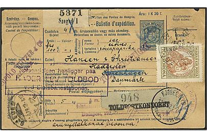 125 kr. frankeret adressekort for pakke fra Szeged d. 22.4.1922 via København til Haderslev, Danmark. Blå pakke-etiket fra Toldpostkontoret.