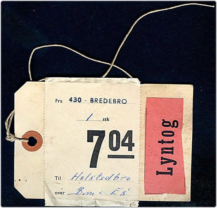 DSB manila-mærke for forsendelse sendt med Lyntog fra Bredebro til Holstebro. Udateret.