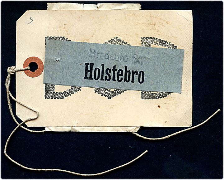 DSB manila-mærke for forsendelse sendt med Lyntog fra Bredebro til Holstebro. Udateret.