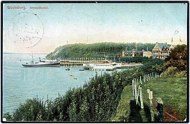 10 pfg. Germania med perfin H.S. på brevkort (Glücksburg Strandhotel med dampskib) fra Flensburg d. 14.9.1908 til Rønne, Danmark.