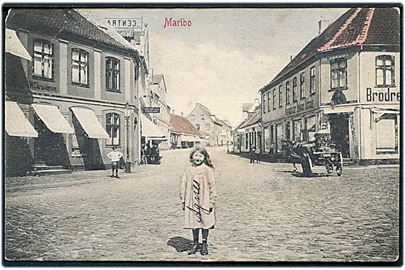 Maribo gadeparti. Ludvig Christensen no. 87. 