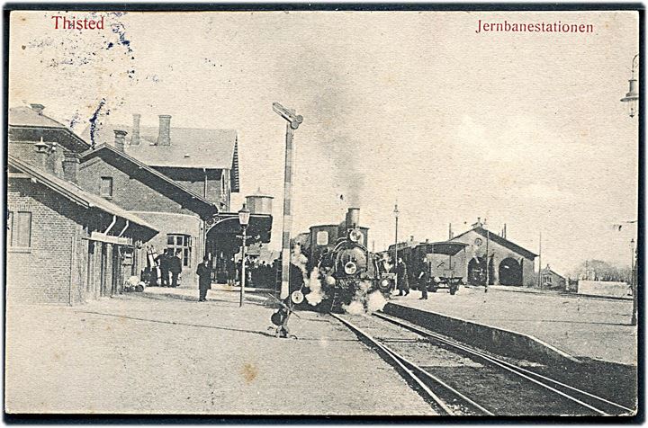Thisted, jernbanestation med damptog. W. & M. no. 197. Stjernestempel KLITMØLLER 1915. Kvalitet 7