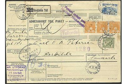 5 kr. Slot, 1 kr. Tre Kroner i 3-stribe og 40 öre Gustaf på internationalt adressekort for pakke fra Stockholm d. 21.6.1946 til Roskilde, Danmark.