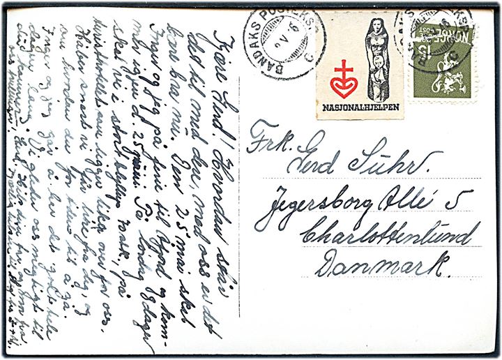 15 øre Løve (defekt) og Nasjonalhjelpen mærket på brevkort annulleret med sejlende bureaustempel Bandaks Posteksp. C d. 8.5.1946 til Charlottenlund, Danmark.