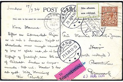 Engelsk 1½d George V på brevkort fra London d. 18.7. 1934 til poste restante i Neksø, Bornholm. Retur med 2-sproget etiket “Ikke afhentet” via Returpostkontoret og forespurgt i København.