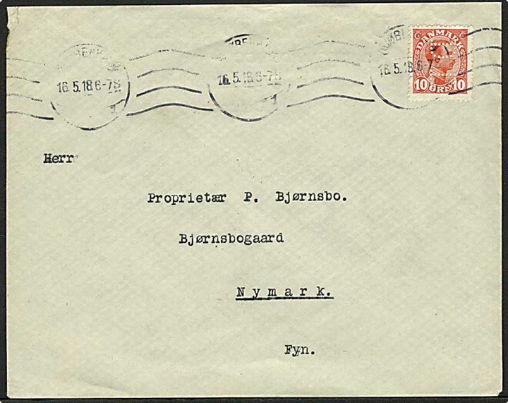 10 øre rød Chr. X på brev fra København d. 16.5.1918 til Nymark. Mærket med perfin D.14 - Danish Dairies.