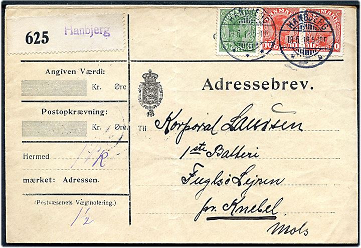 5 øre og 10 øre (par) Chr. X på adressebrev for pakke annulleret med brotype Ia Hanbjerg d. 18.6.1918 til soldat ved 1. Batteri i Fuglsølejren pr. Knebel. Blanko-pakke etiket med liniestempel Hanbjerg.