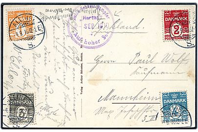 1 øre, 2 øre, 3 øre og 4 øre Bølgelinie på firefarve frankeret brevkort annulleret med brotype Ia Allinge S. (benyttet i Sandvig) d. 4.9.1910 og sidestemplet med privat skibsstempel Salon-Schnell-Dampfer Hertha * Auf hoher See d. 4.9.1910 til Mannheim, Tyskland.