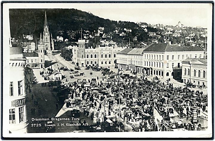 15 øre Løve på brevkort (Drammen, Bragernes Torv) annulleret Oslo d. 5.7.1934 og sidestemplet (posthorn)/Fra Tog til København.