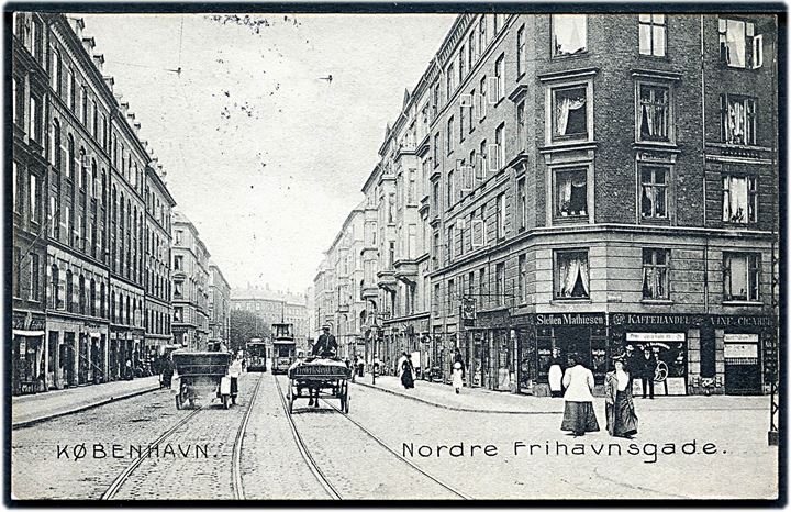 Nordre Frihavnsgade med Steffen Mathiasens Kaffehandel og sporvogne. Stenders no. 11266. Kvalitet 8