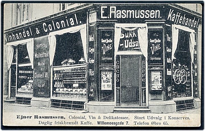 Willemoesgade 7 med E. Rasmussen’s Vinhandel, Colonial og Kaffehandel. Reklamekort u/no. Kvalitet 8