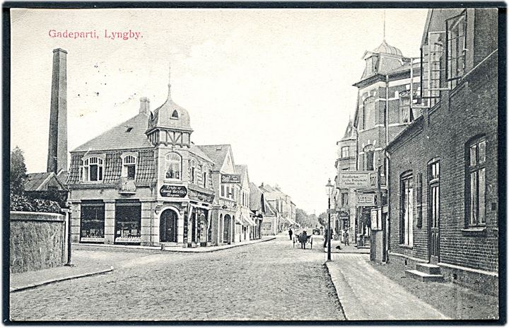 Lyngby, Lyngby Hovedgade 5 med Lyngby ny Colonial. Mel- & Gryn Magasin. G. M. no. 2556. Kvalitet 8