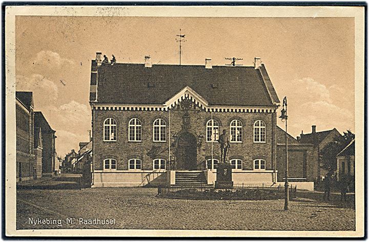 5 øre Chr. X på brevkort (Nykøbing M., Raadhuset) annulleret med brotype IIIb Vildsund d. 28.7.1919 til Flakkebjerg. Kortet har haft fugt.