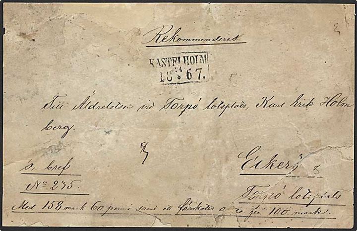 1867. Brevforside fra ufrankeret værdiforsendelse med rammestempel Kastelholm d. 24.8.1867 til Torpö pr. Eckerö. Meget medtaget, men sjældent stempel.