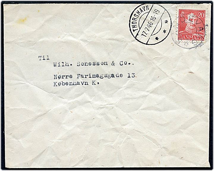 20 øre Chr. X på brev annulleret med udslebet stjernestempel SANDEVAAG og sidestemplet Thorshavn d. 17.7.1946 til København. Kuvert med folder.