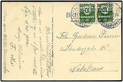 10 øre Bølgelinie i parstykke på brevkort (Ahlgade, Holbæk) dateret på Københavns Hovedbanegård og annulleret med bureaustempel Kjøbenhavn - Warnemünde T.74 d. 18.8.1925 til Nakskov.