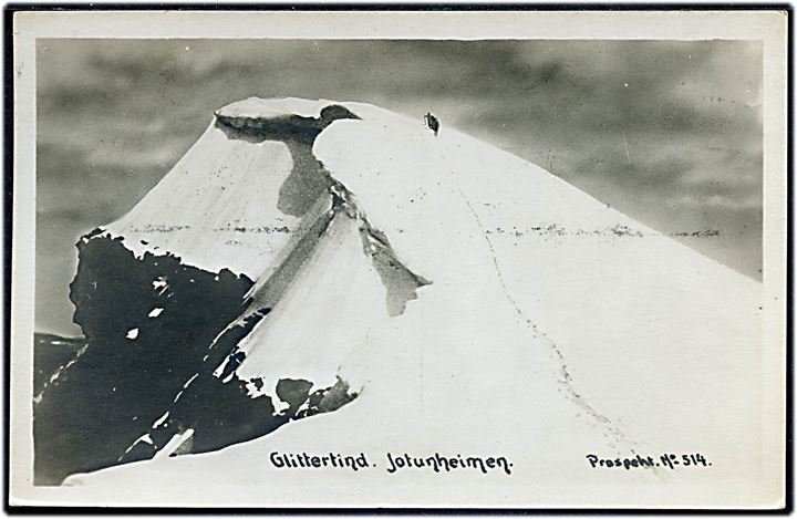15 øre Løve på brevkort (Glittertind, Jotunheimen) annulleret i Oslo d. 7.3.1935 og sidestemplet med violet rammestempel (Posthorn) Fra Tog til København, Danmark.