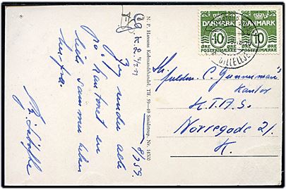 10 øre Bølgelinie (2) på brevkort (Smidstrup Strand) annulleret med pr.-stempel Smidstrup Strand pr. Gilleleje d. 9.7.1959 til København. Smidstrup Strand var et sommer-brevsamlingssted. 3 nålehuller.