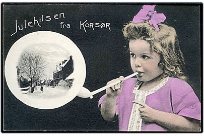 Korsør, Julehilsen fra, pige og sæbe boble med gadeparti i sne. H. P. Jensen no. 16473.