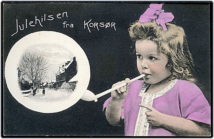 Korsør, Julehilsen fra, pige og sæbe boble med gadeparti i sne. H. P. Jensen no. 16473.