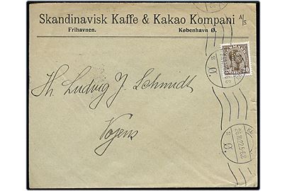 20 øre Chr. X med perfin F.K. på firmakuvert fra Skandinavisk Kaffe & Kakao Kompani Frihavnen stemplet København Ø d. 26.10.1922 til Vojens.