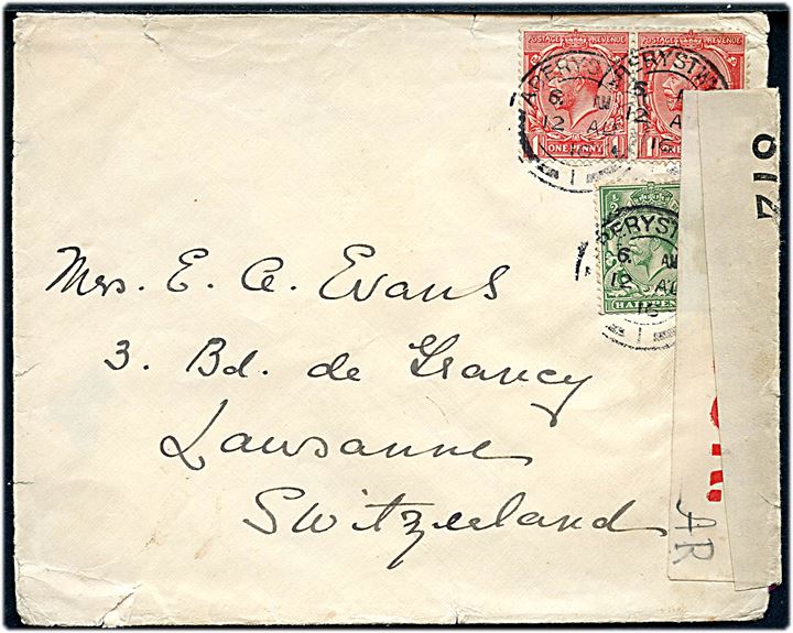 ½d ig 1d (par) George V på brev fra Aberystwyth d. 12.8.1916 til Lausanne, Schweiz. Dobbelt censureret med først hvid banderole m. rød skrift og signatur AR og efterfølgende alm. banderole med nr. 872.