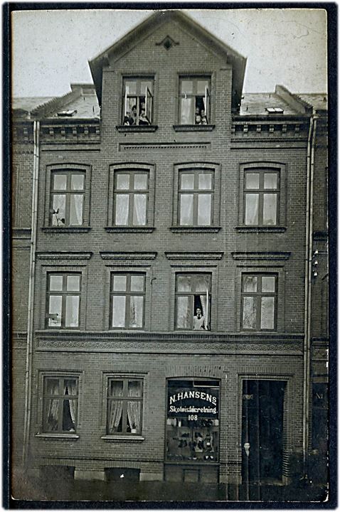 Odense. Vesterbro 108 med N. Hansens Skotøjsforretning. Fotokort u/no. Brugt i Odense med julemærke 1909