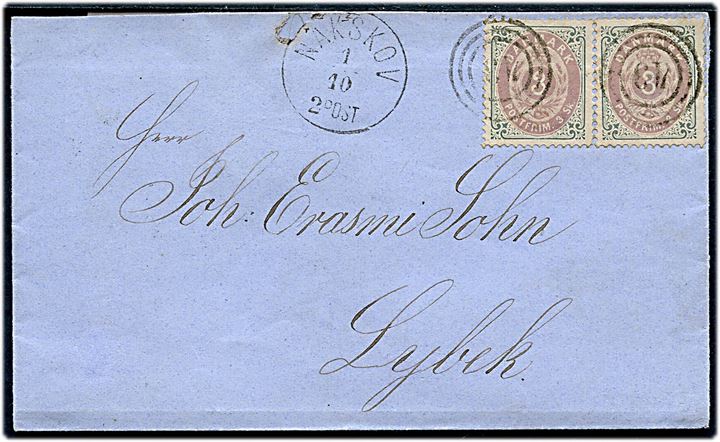 3 sk. (3) Tofarvet på brev annulleret med nr.stempel 43 og sidestemplet lapidar Nakskov d. 1.10.1872 til Lübeck. Særtakst fra Danmark til Hertugdømmerne og Nordtyskland.