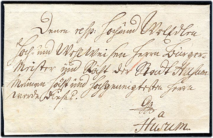 1754. Portobrev med indhold dateret d, 24.3.1754 og på bagsiden håndskrevet bynavn Slage(else) til Husum i Schleswig. Modtager betalt 7+1 sk. i porto.