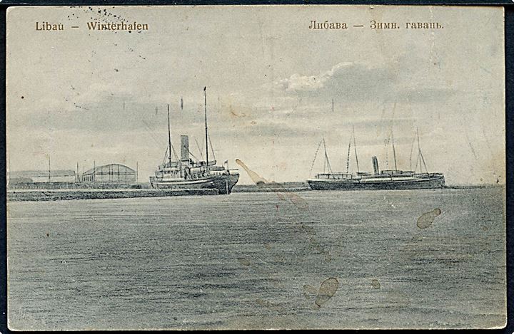 Ufrankeret feltpostkort (Libau Winterhafen) dateret i Libau med feltpoststempel K.D. Feldpoststation * Nr. 168 * d. 8.10.1916 til Wilhelmshaven. Rødt briefstempel 2. Marine-Kompagnie Libau. Sendt fra sømand ombord på tanker S.M.H. Pechelbronn.
