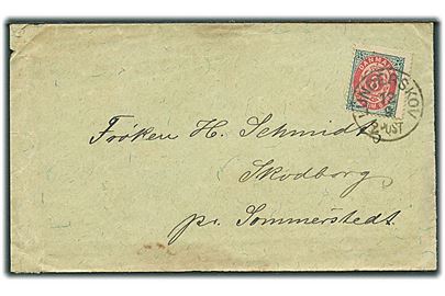 8 øre Tofarvet på GRÆNSEPORTO brev annulleret med lapidar Lunderskov d. 12.9.1891 til Skodborg pr. Sommerstedt i Nordslesvig. På bagsiden ank.stempel Schottburg d. 12.9.1891. Nusset.