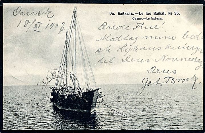 3 kop. Våben på brevkort (Sejlskib på Baikalsøen) dateret i Omsk og annulleret med ovalt jernbanestationsstempel Omsk Vokz. d. 18.11.1907 til dansker i Bernaul, Tomsk gub. i Sibirien. Ank.stemplet d. 22.11.1907.