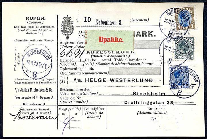 40 øre, 1 kr. og 2 kr. Chr. X på internationalt adressekort for ilpakke fra Kjøbenhavn 8 d. 12.11.1923 til Stockholm, Sverige. Påsat etiket - formular Nr. 97 b 122 Ilpakke.